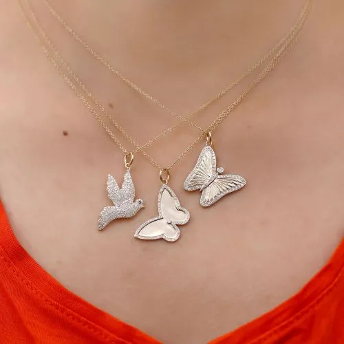 Diamond Pigeon Symbol Pendant
